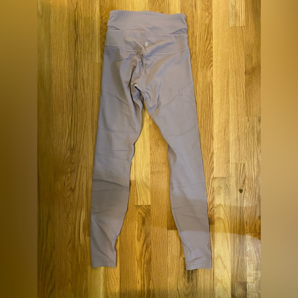 Light purple Lululemon Leggings with mesh waste detail